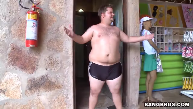 Two horny guys walking along Brazilian beach