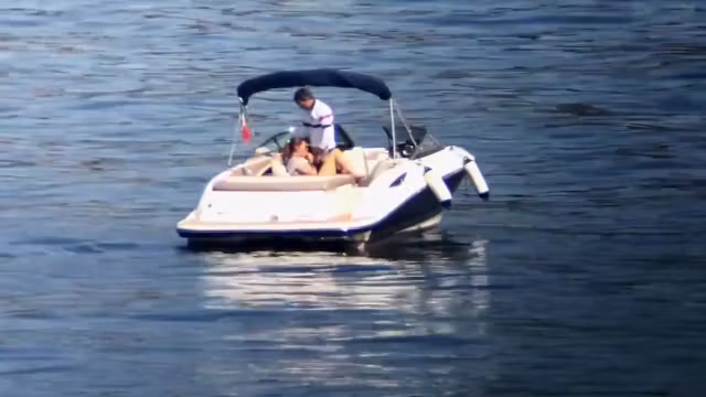 Tasty babe sucks on a cock in the middle of the sea