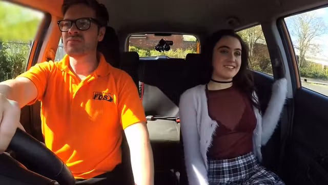 Natural brunette student rides instructor