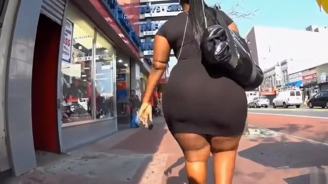 Ebony BBW with a huge booty walks down the street