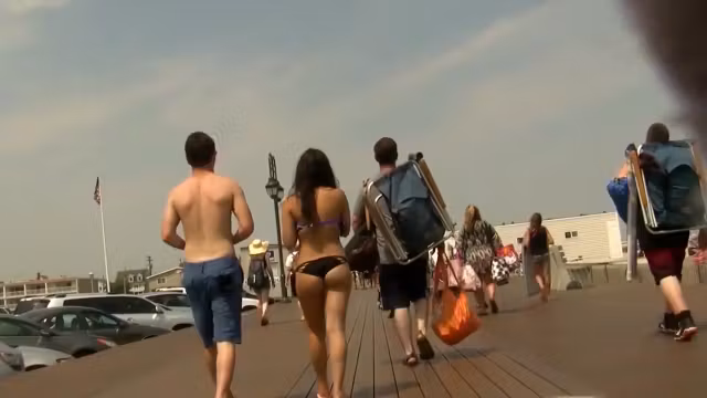 Tight booty hottie in black bikini bottoms