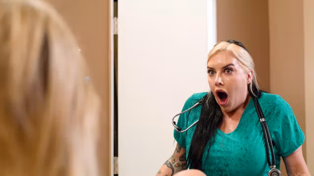 Busty tattooed blonde squirting all over the big tits nurse