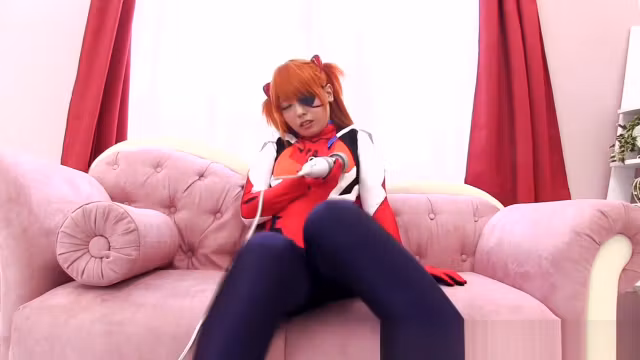 Japanese cosplay ginger babe tugging cock