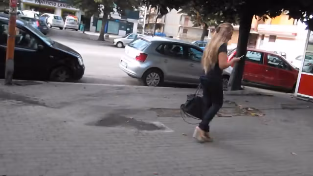 Spy beautiful blonde's ass in tight jeans and wedges