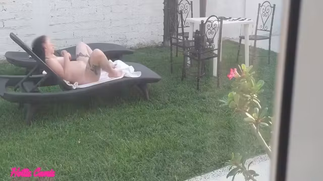 I Recorded My Stepsister Sunbathing Naked And Masturbating In The Garden