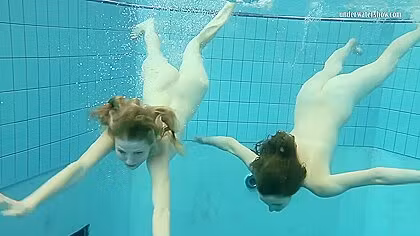 Nastya Undresses Libuse In The Pool Like A Lesbian