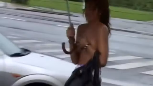 Guy pulls a blonde girl's top down