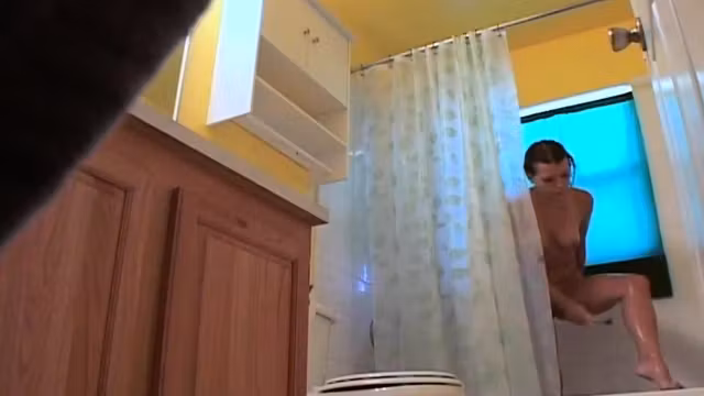 Stepsister shaves her pussy in the shower