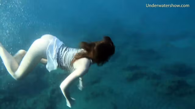 Swimming gracefully naked underwater