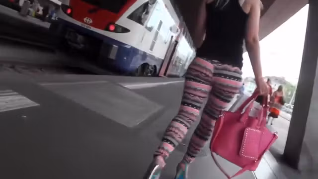 Delicious blonde with big ass walks around in tight leggings