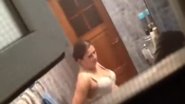 Peeping on a chubby naked girl