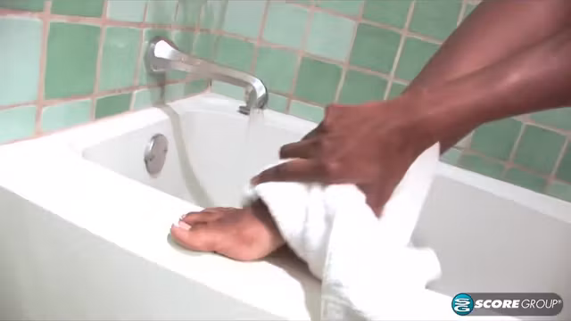 Bare legs in the bath