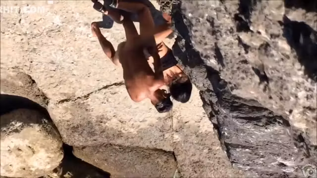 Filly's pussy gets penetrated on the rocky beach