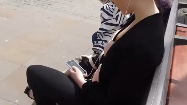 Gentle young breasts in downblouse