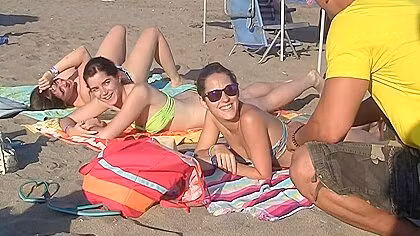 Spanish chicks seduced on a beach