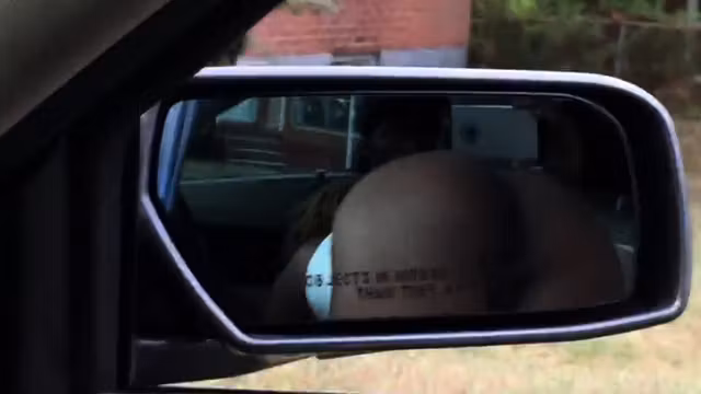Black slut sucking dick in front seat of car