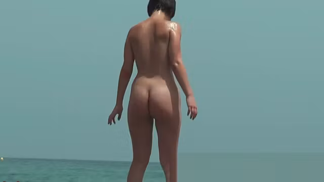 Real beach nudist pussies stretching on the sand