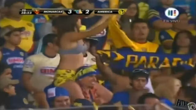 Curvy fangirl shows off her boobs on the football match