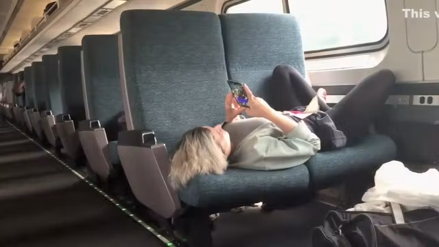 Hot babe spreads across two seats