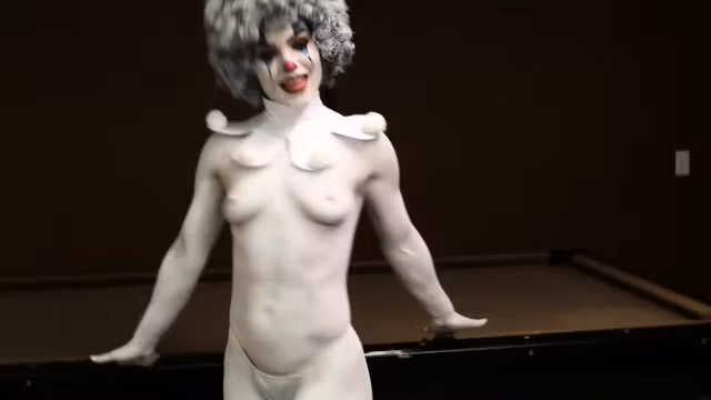 Cosplay video with naked clown babe