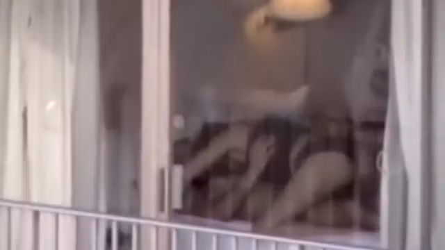 zooms on sex in a hotel room