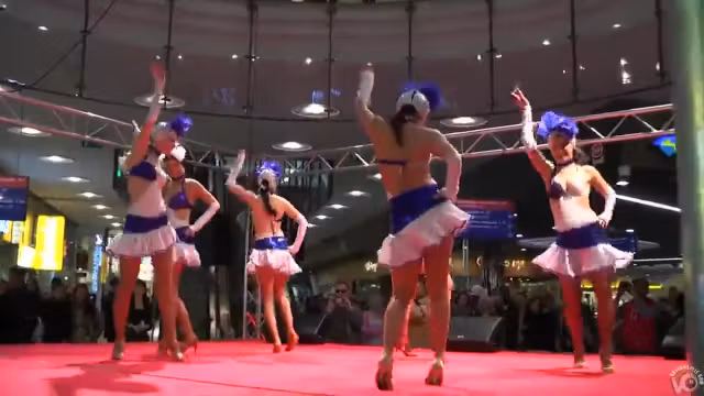 Sexy girls in short skirts dancing for the crowd