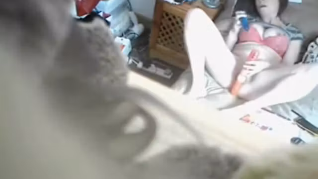 Mature lady caught using two dildos