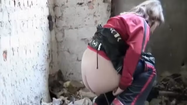 Athletic chick stopped to pee in ruins