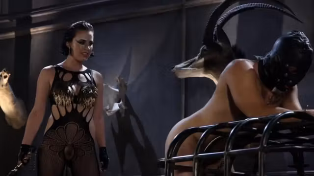 BDSM lady torturing submissive guy