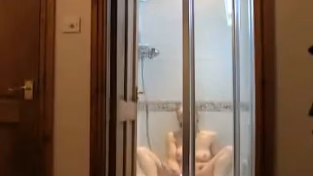 Milf spied masturbating in the shower