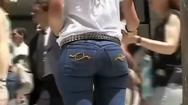 Girl with a sexy ass handing flyers