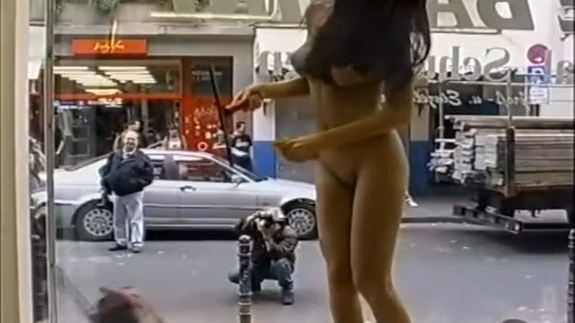 Young flexible looker poses completely naked in the store
