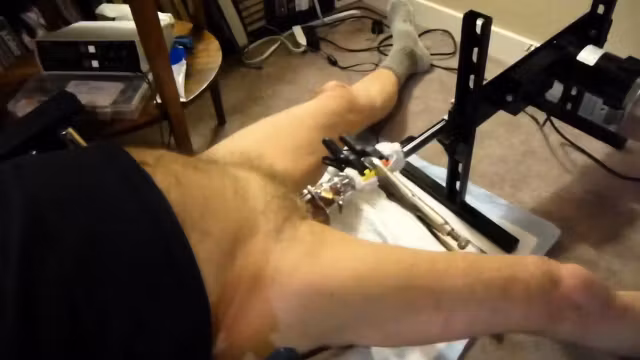 Fuck machine sounding my cock in chastity cage