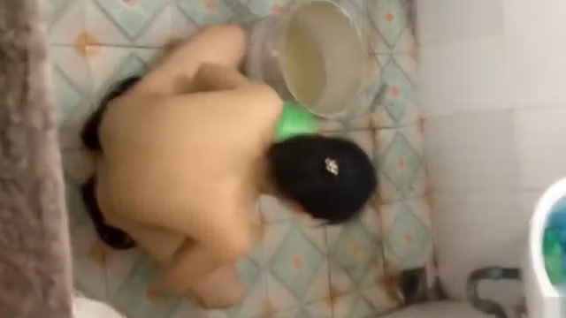 Kinky bathroom image with a hairy woman