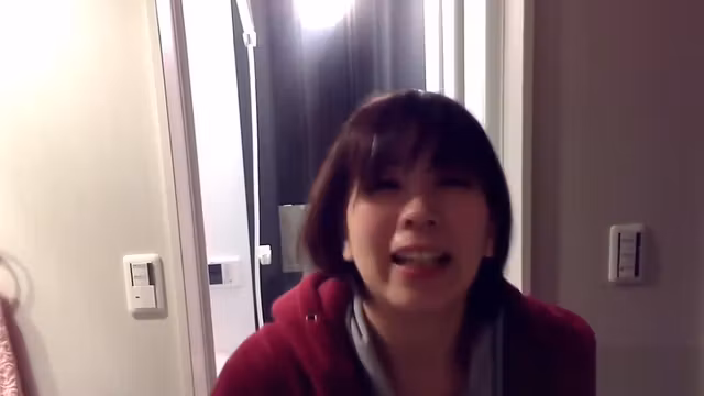 Peeing asian fills glass