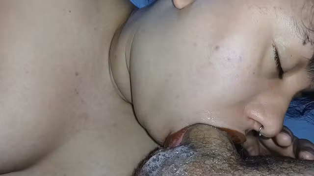 Smudging Her Big Lips With Lipstick While Devouring His Hard Cock