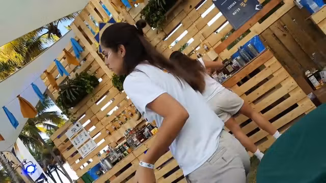 Slightly bent over to take a piss